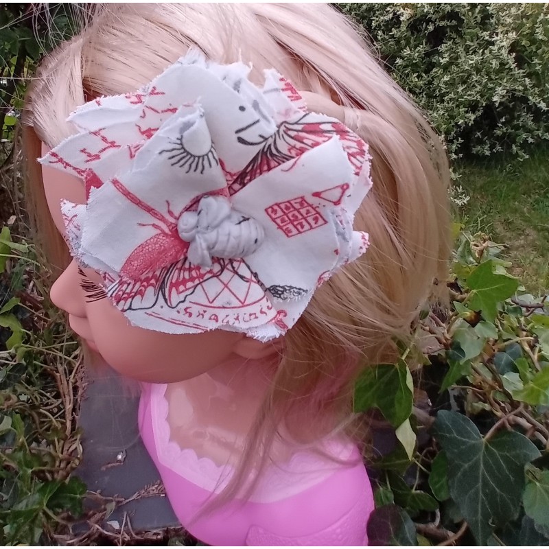 barrette fleur et insecte blanche et rouge