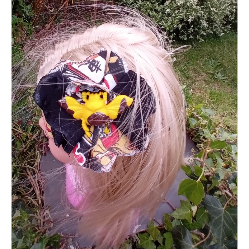 barrette fleur insecte noire et jaune