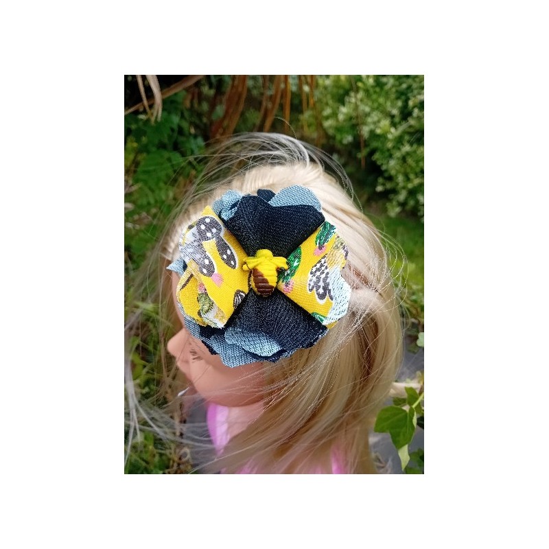 barette fleur jaune et noire