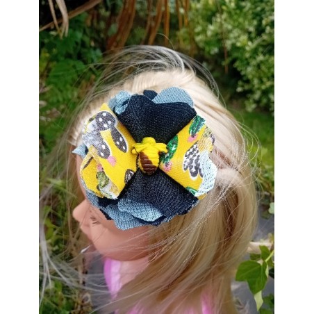 barette fleur jaune et noire