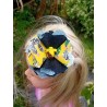 barette fleur jaune et noire
