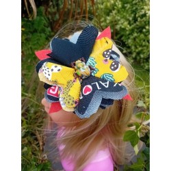 barette fleur insecte jaune et noire