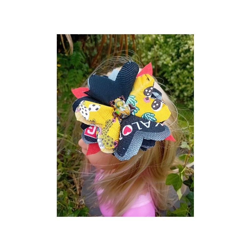 barette fleur insecte jaune et noire