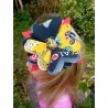 barette fleur insecte jaune et noire
